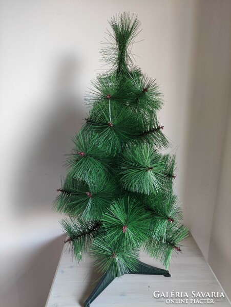 Very elegant small retro artificial Christmas tree with topper