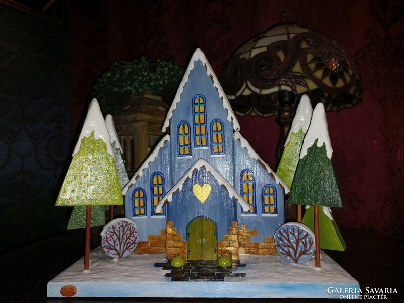 Handmade winter, Christmas decoration, church (house, cottage) made of recycled wood