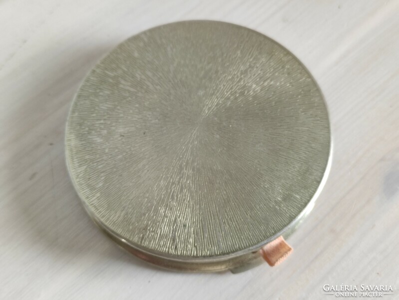 Beautiful silver colored original French powder box