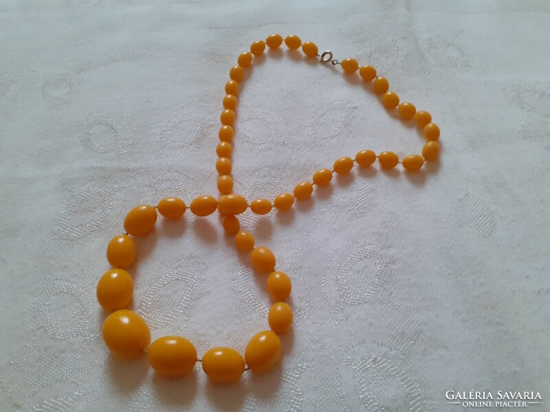 Older plastic necklace with decreasing links (not vinyl)