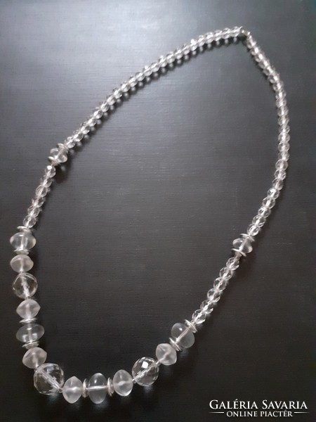Showy faceted glass necklace with eyes of different sizes and shapes