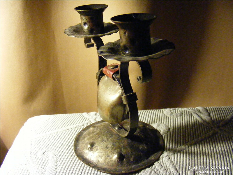 Retro two-pronged metal candle holder with lunch invitation column in the middle