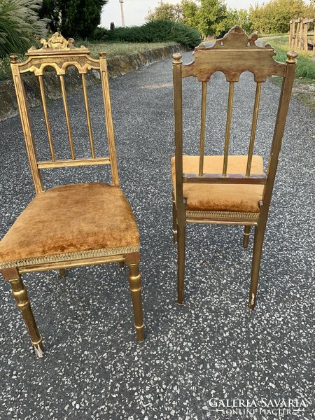 xvi. A pair of Louis-style French gilded chairs