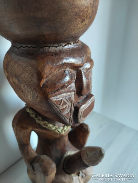 Peruvian totem, fertility statue made of wood