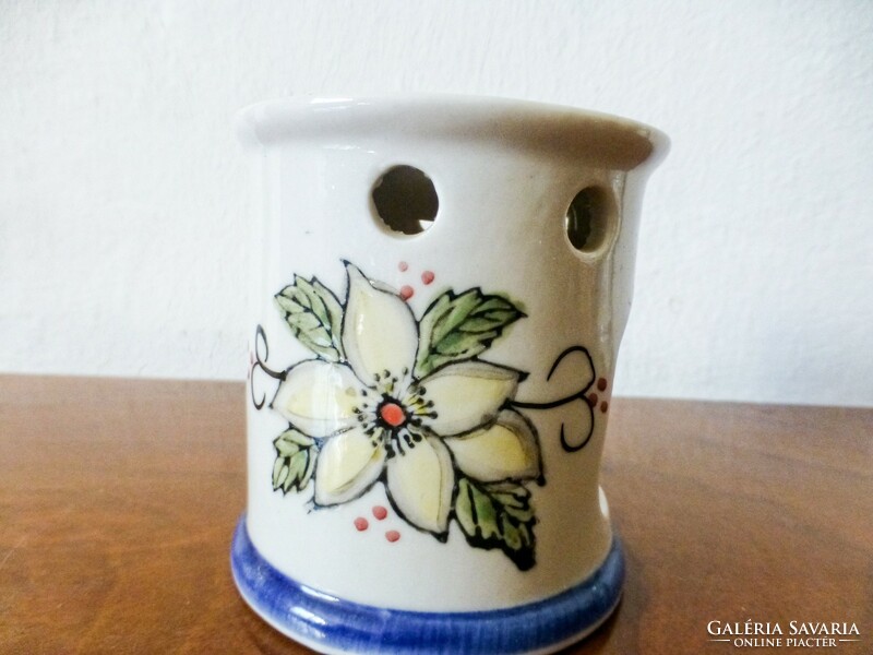 White poinsettia patterned ceramic candle holder