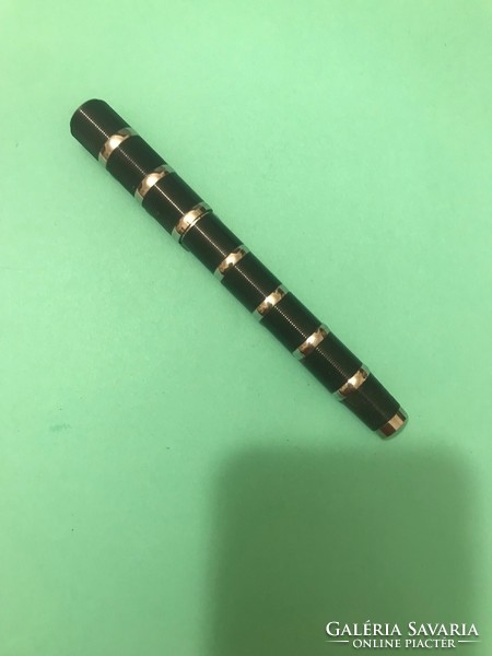 Retro ballpoint pen. 13 cm long. The cap is missing in the upper part. Black with silver decorations.