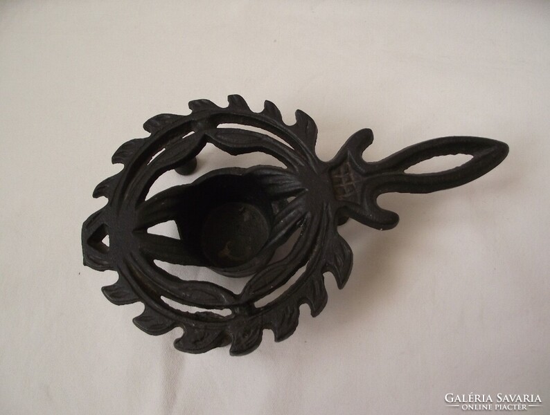 Cast iron candle holder