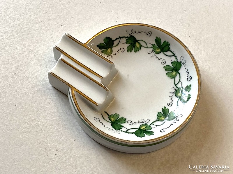 A 1950s painted porcelain ashtray with an art deco feel, painted with grape leaves