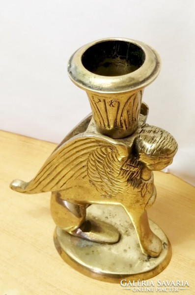 Chimera-shaped candle holder made of bronze. Vitange is a specialty