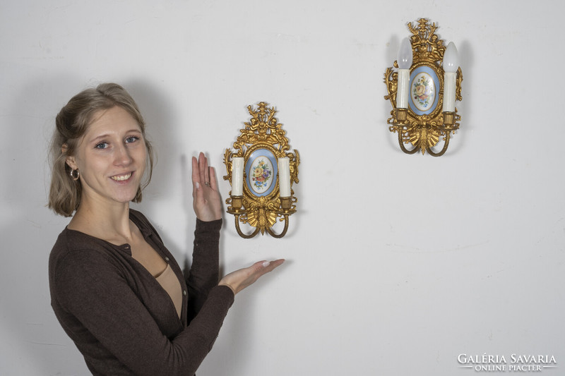 Neo-baroque gilded wall arm paired with porcelain insert