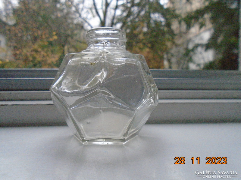 Interesting glass bottle marked with 12 pentagon-shaped sides
