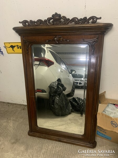 German pewter wall mirror with a small damage to the decoration of the carving, mirror in perfect condition