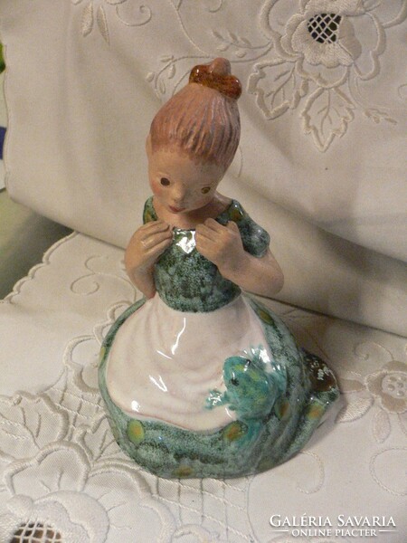 Butcher's gauze marked ceramic girl with a frog