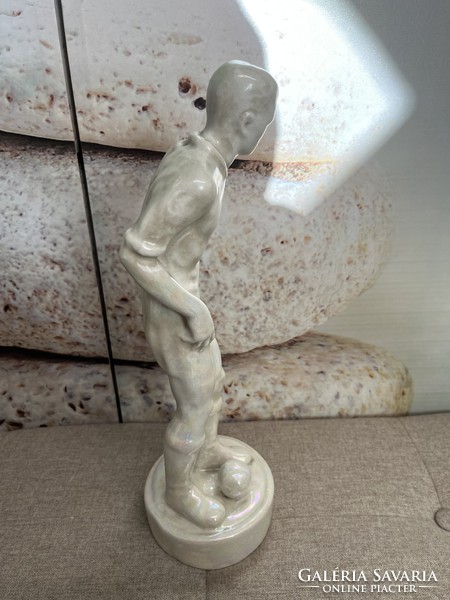 Porcelain faience soccer player statue with iridescent glaze a62