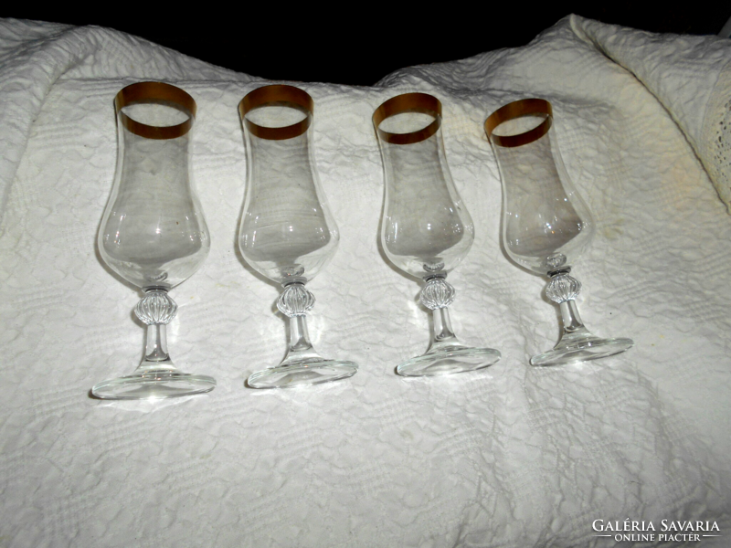 4 old stemmed glass glasses - with a wide golden rim - the price applies to 4 pieces