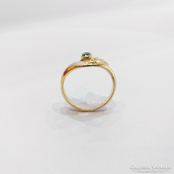 14 Carats, 3.16g. Gold women's ring with green stones, in new condition! (No. 23/53)