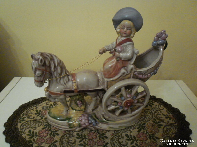 Lippelsdorf porcelain - a beautiful little girl driving a carriage
