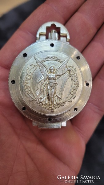 Olympia mechanical pocket watch.