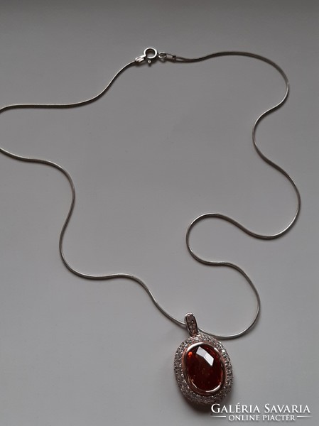 Three silver marked necklaces with a pendant decorated with crystals and zircons