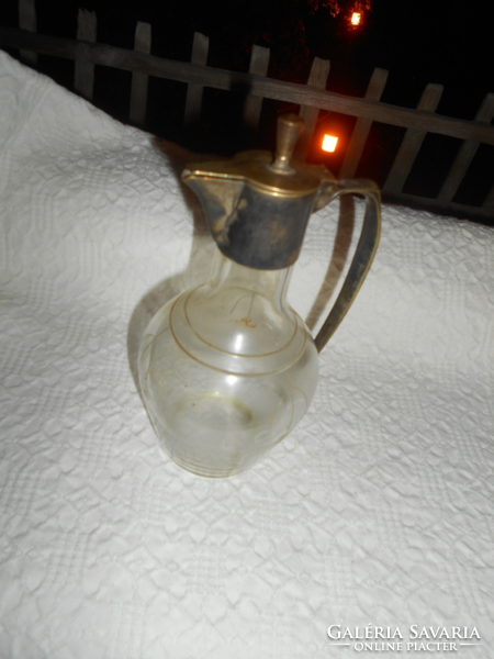 Antique polished glass decanter with metal fitting