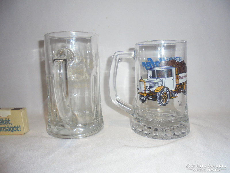 Two glass beer mugs - together