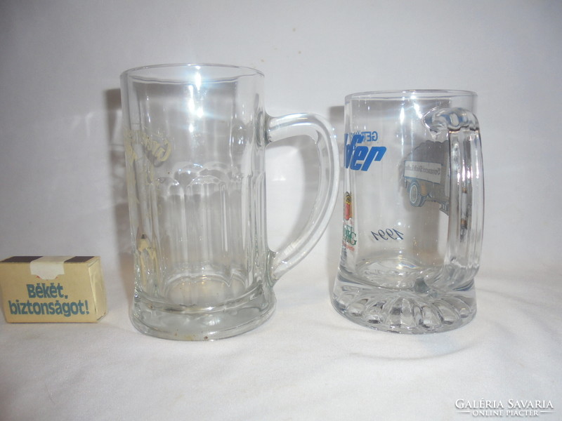 Two glass beer mugs - together