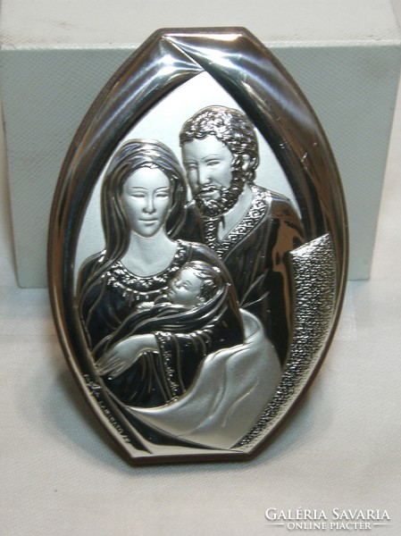 The Holy Family is a relief printed on a silver plate