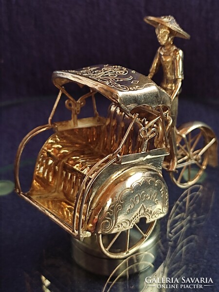 Miniature silver rickshaw