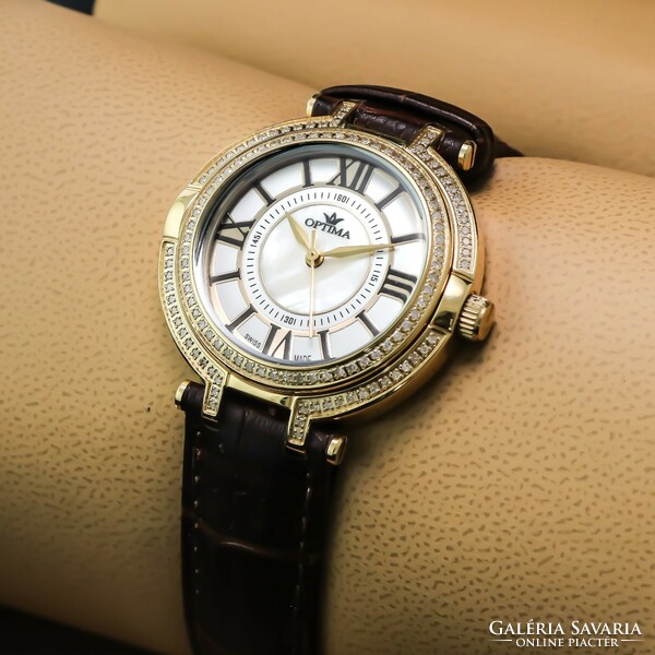 Optima Swiss Diamond egy gyönyörű és különleges óra 120 db valódi fehér gyémánttal díszítve
