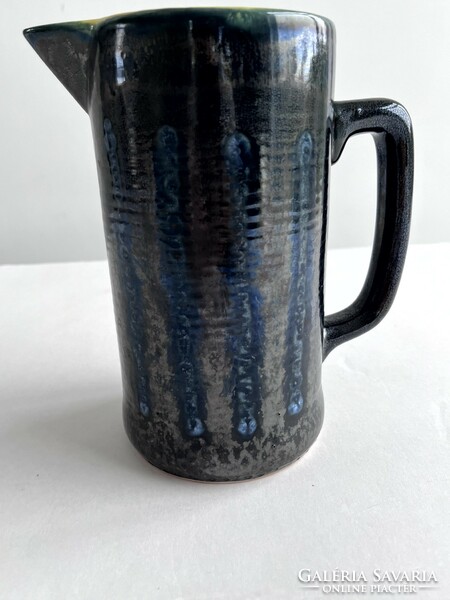 Retro, old pond head ceramic jug, spout