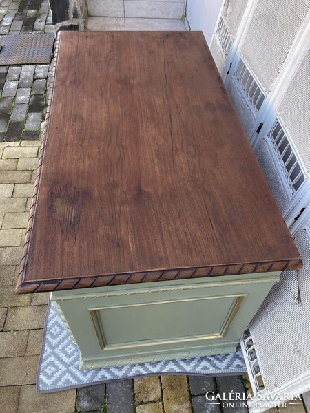 Very very old large chest of drawers, in a vintage atmosphere