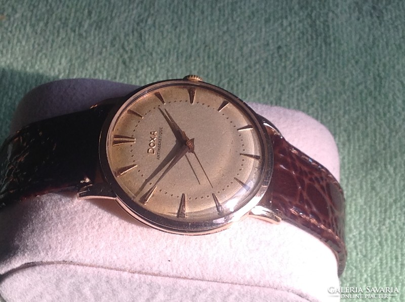 Doxa 14k gold watch with factory gold case and rare strap lugs from the 1950s