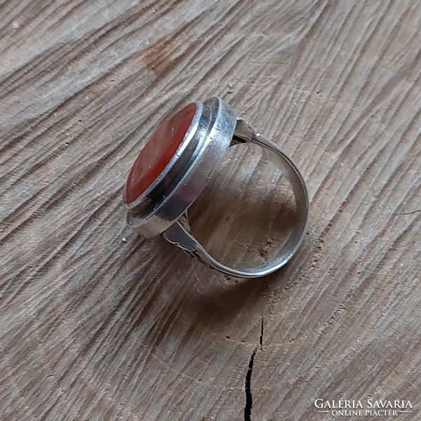 A wonderful old silver signet ring with a red stone