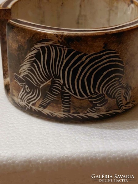 Drink coaster with an image of an African animal