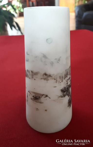 Small alabaster vase with blurred landscape