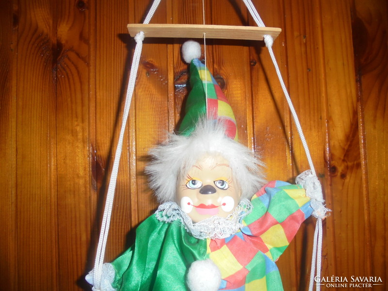 Retro rocking, hanging clown doll figure