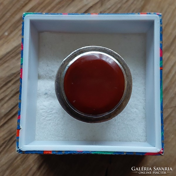 A wonderful old silver signet ring with a red stone