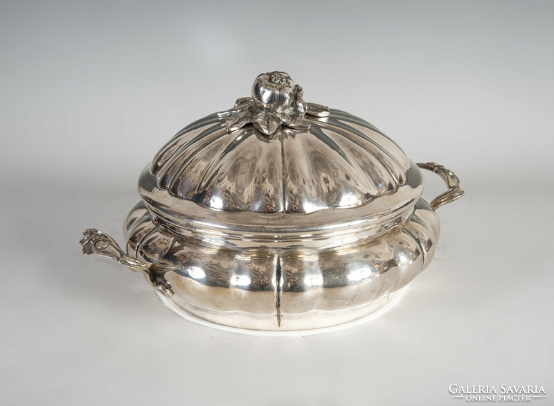 Silver covered bowl with a plastic pomegranate decoration on the lid