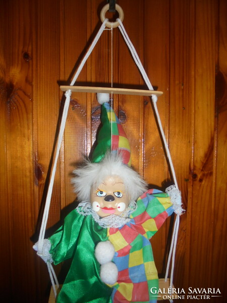 Retro rocking, hanging clown doll figure