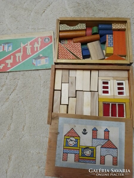 Two sets of retro wooden construction toys for sale together.