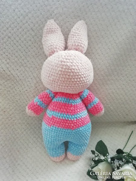 Crocheted plush bunny in pajamas