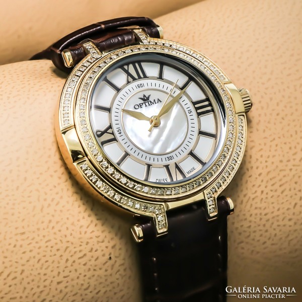 Optima Swiss Diamond egy gyönyörű és különleges óra 120 db valódi fehér gyémánttal díszítve