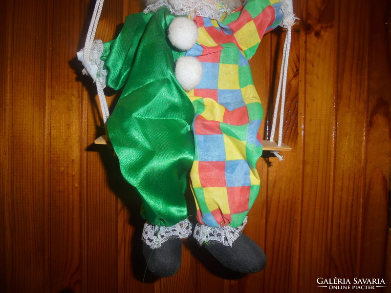 Retro rocking, hanging clown doll figure