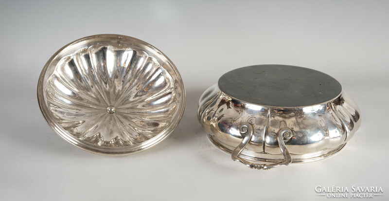 Silver covered bowl with a plastic pomegranate decoration on the lid