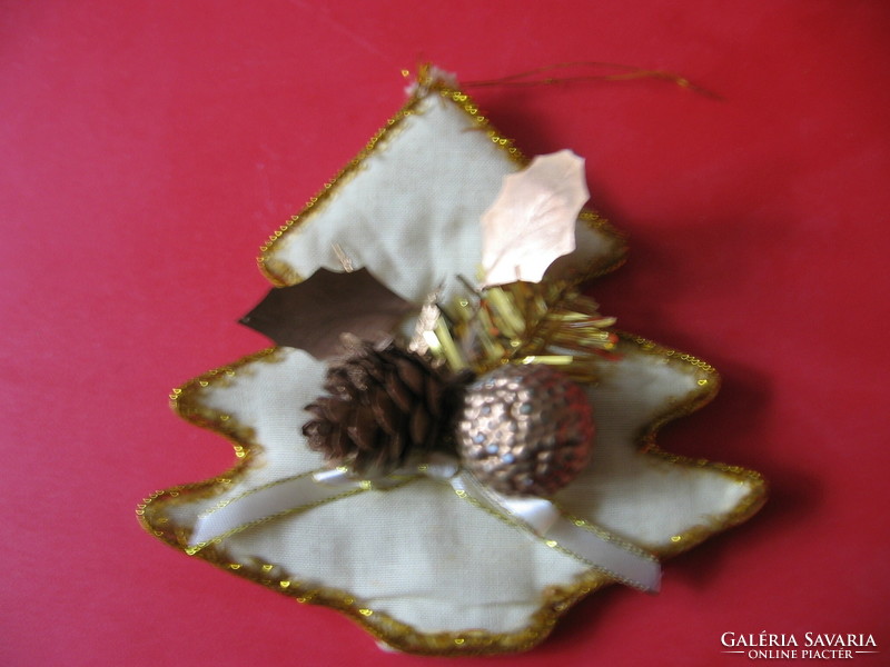 Retro handmade Christmas tree ornament in the shape of a pine tree