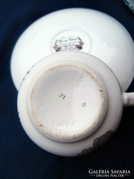 Old earthenware tea cup + saucer
