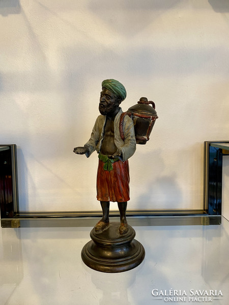 Large Viennese bronze water barrel oriental man