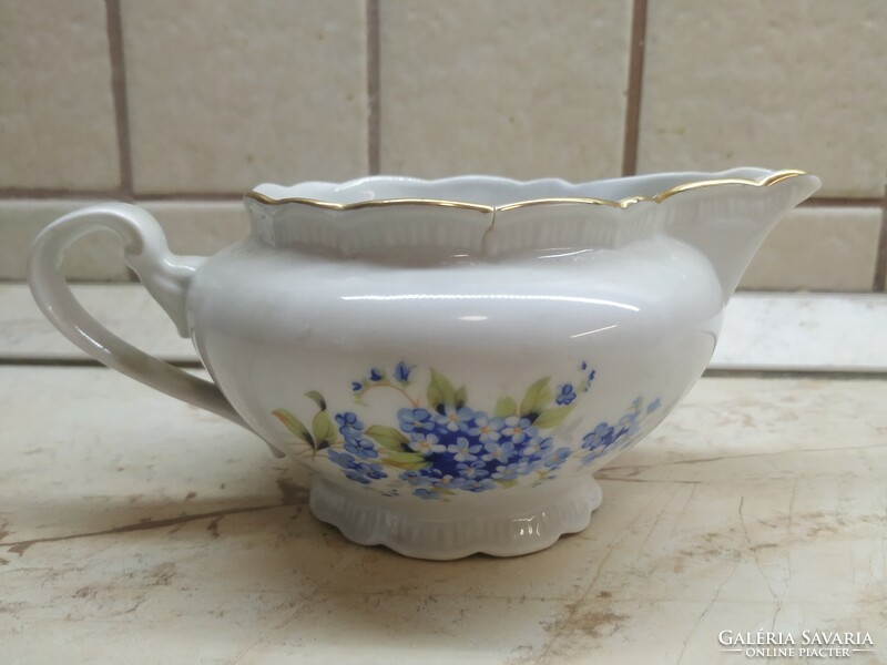 Porcelain violet sauce pourer. Good seller!