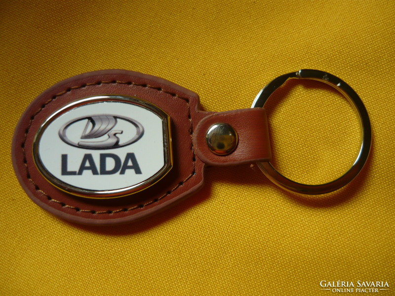Lada oval metal key ring on a leather base