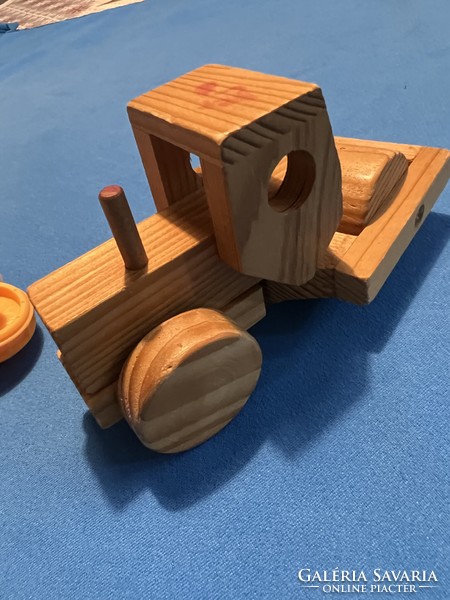 Wooden road roller and plastic molding engine together
